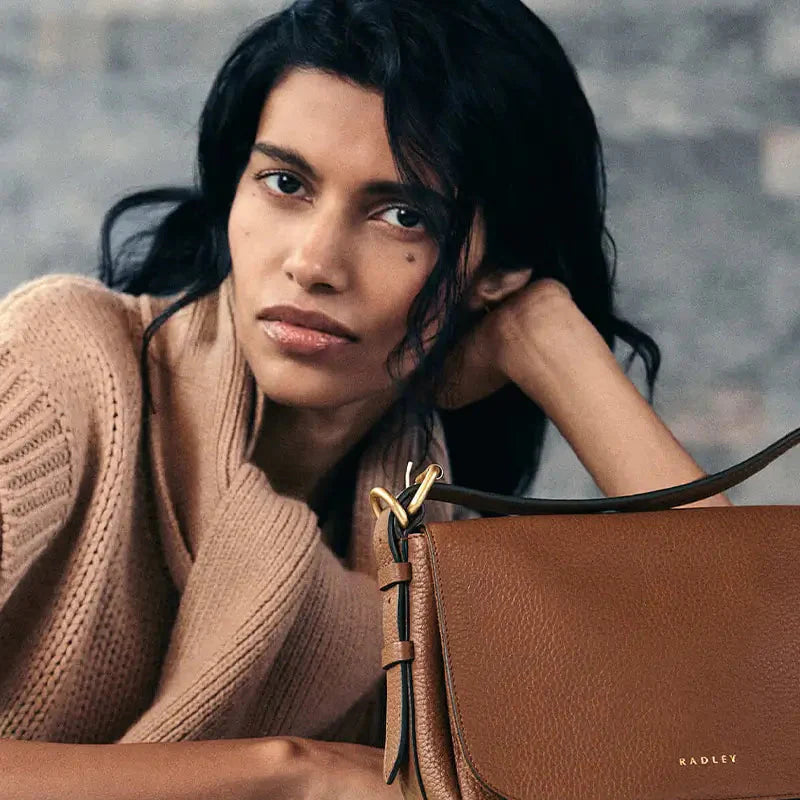Essential handbag accessories every woman needs